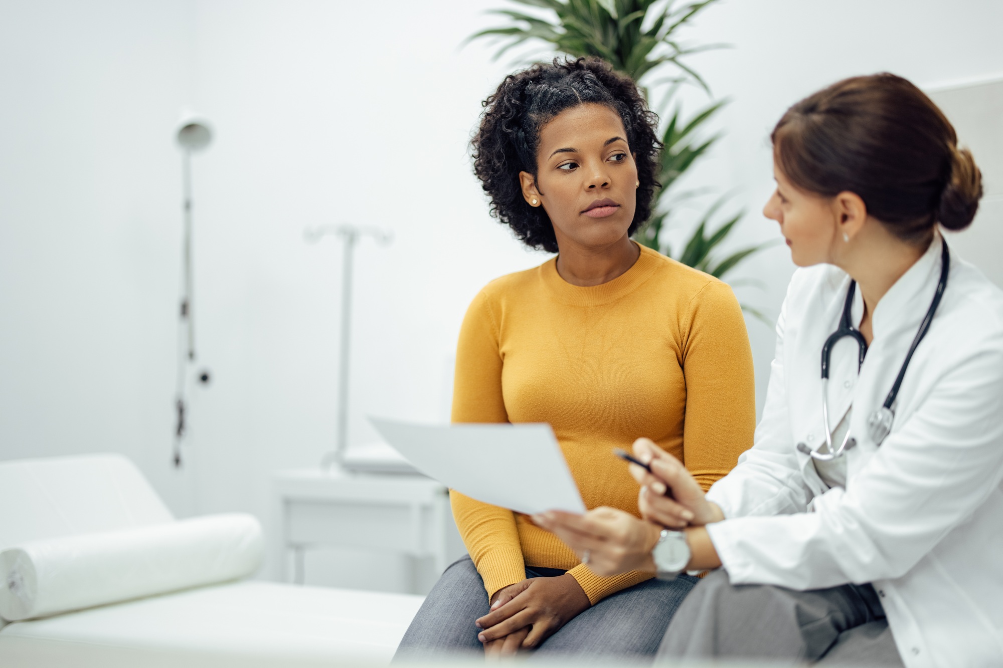 Doctor and patient talking about test results.